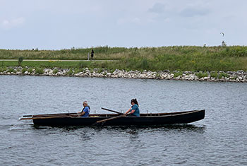 People rowing a boat